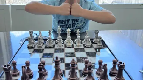 Craig Ceccanti's son playing chess