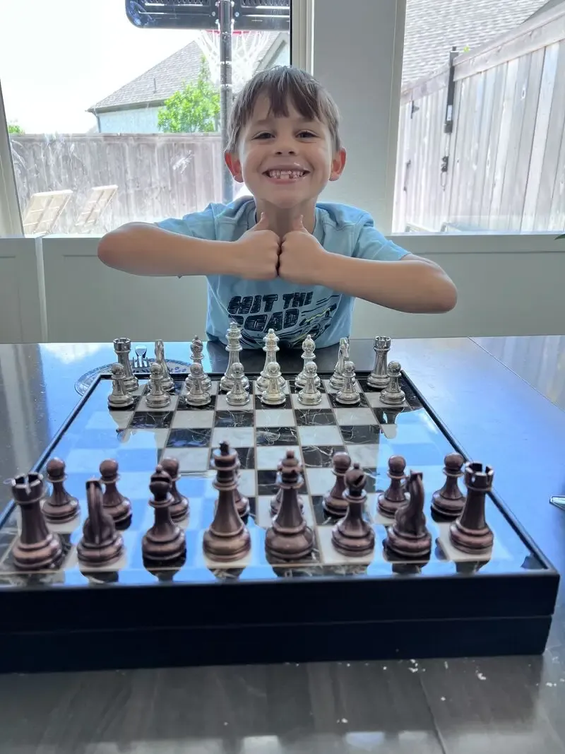 Craig Ceccanti's son playing chess