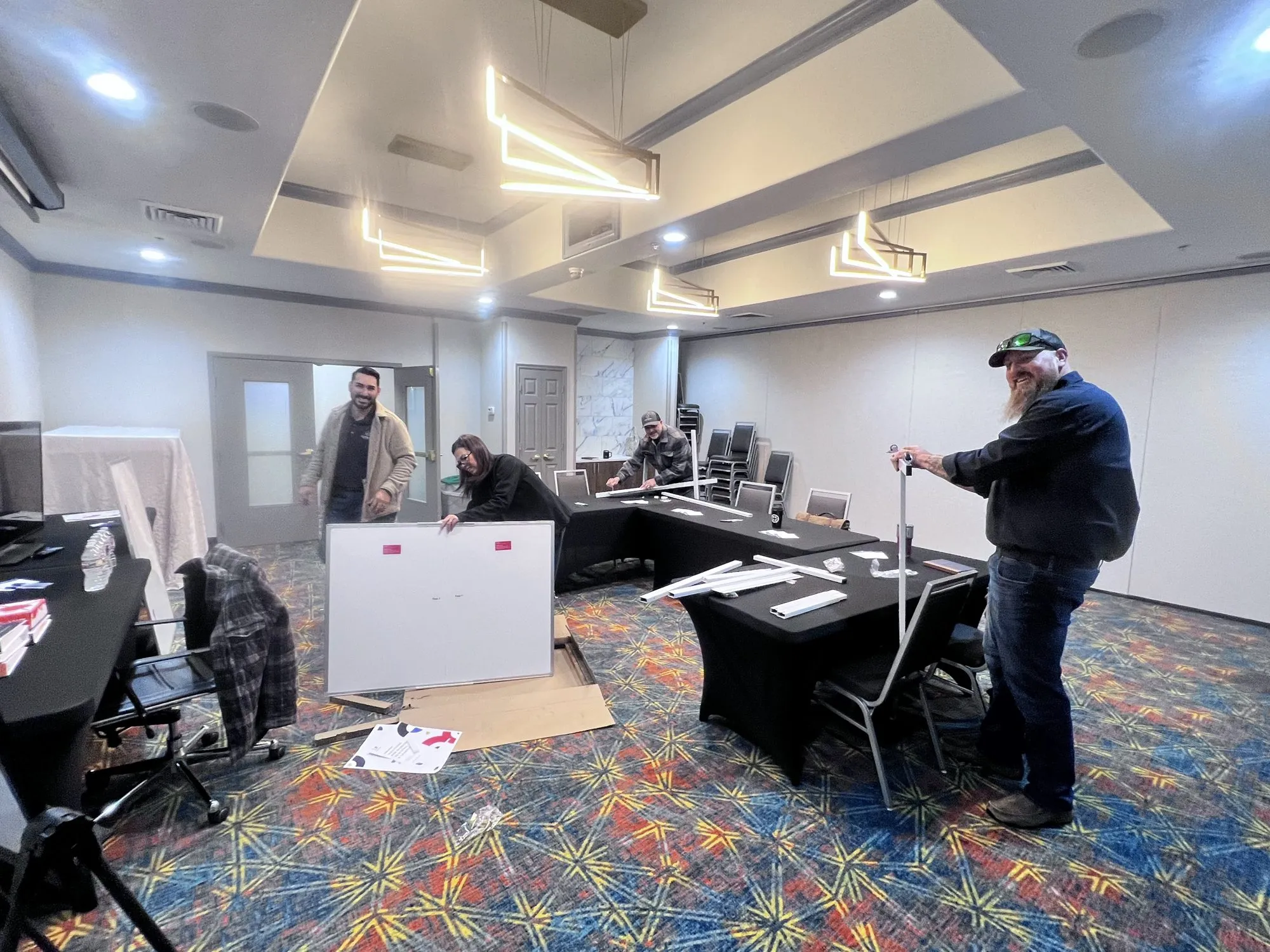 The Adtech Motors team assembling their own whiteboards at the Oklahoma City Focus Day.