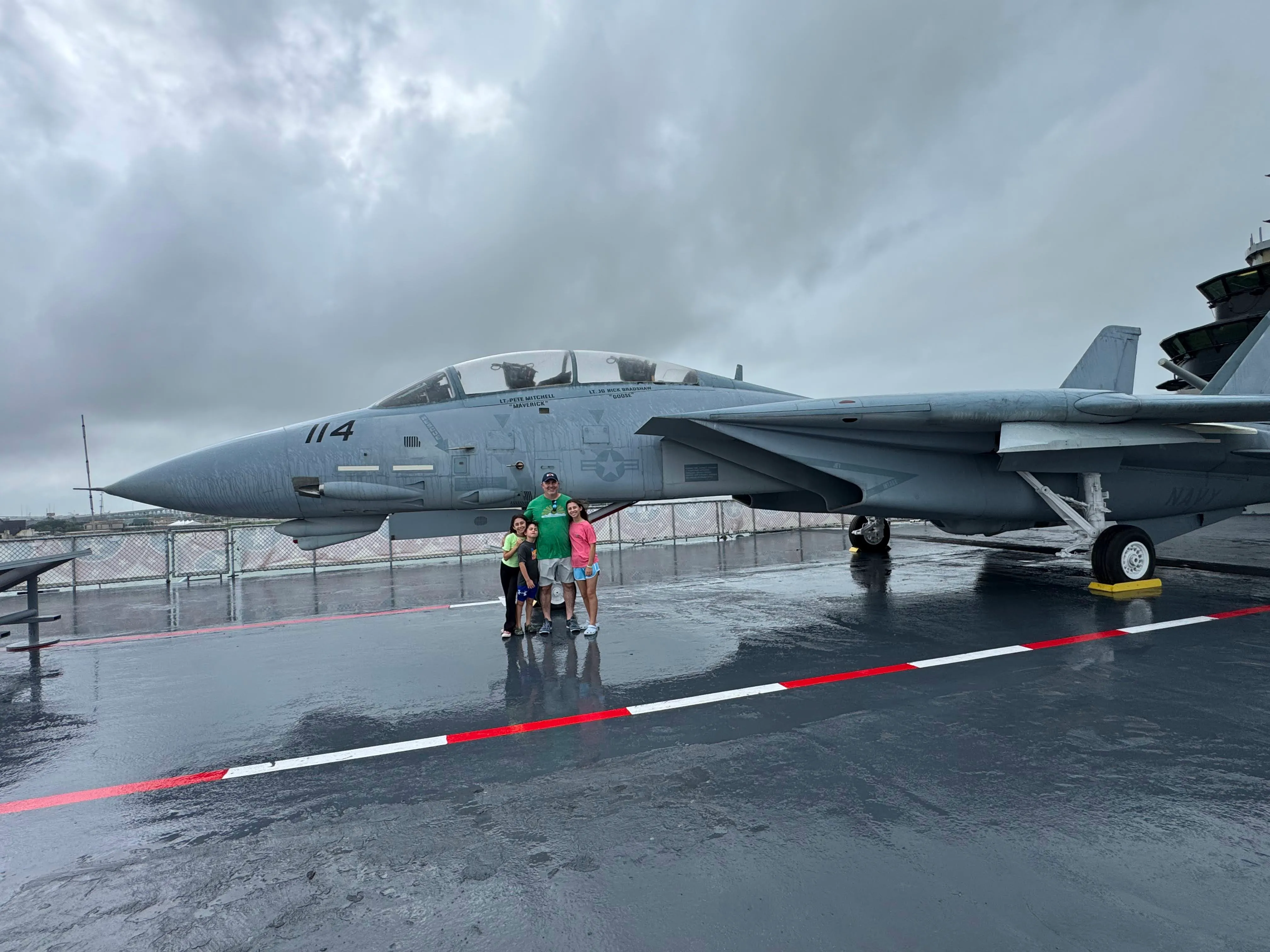 Craig Ceccanti and his kids in front of the F-14 Tomcat flown in the original Top Gun